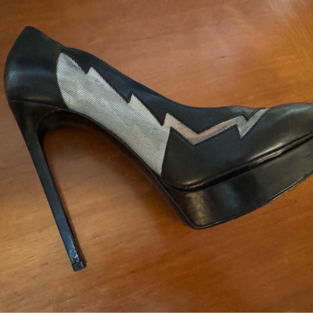 Yves saint Laurent women’s black & silver lightening bolt. Great condition.